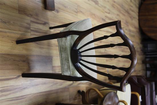 A pair of George III Hepplewhite period shield back chairs,